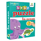 Bebe puzzle. In ocean